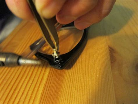 fix broken eyeglass frame hinge.